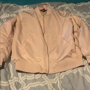Peach/ soft pink bomber